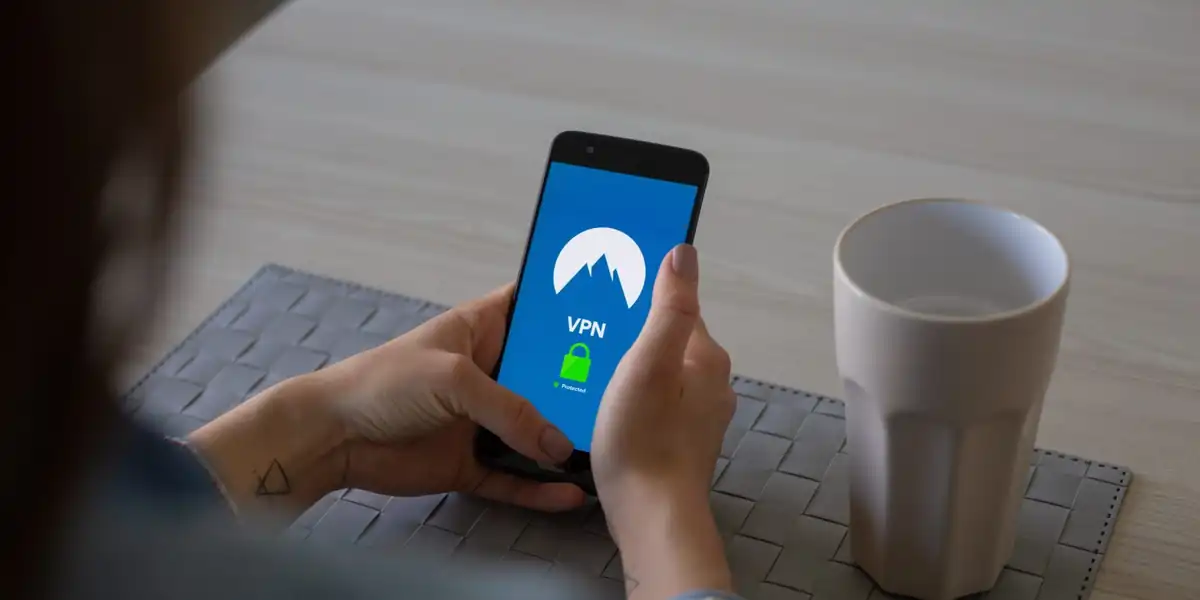 a person uses a VPN service on a mobile phone